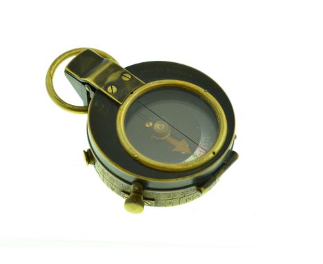 A military compass marked 'Cruchon &amp; Emons London' numbered 50367 - 1916, in fitted leather pouch