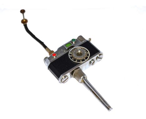 A novelty camera lighter, circa 1950's, with tripod &amp; locking mechanism 