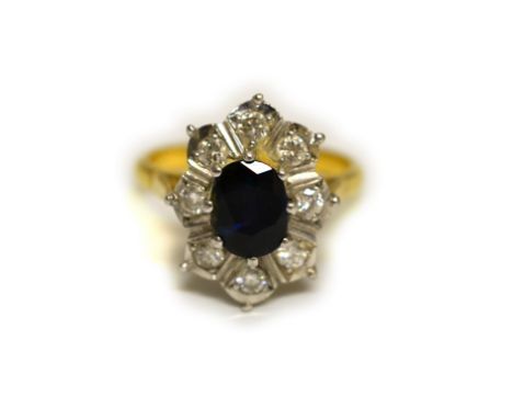 A sapphire &amp; diamond ring stamped 18ct-plat, the eight round brilliant cut diamonds total approx 0.40cts, approx colour H