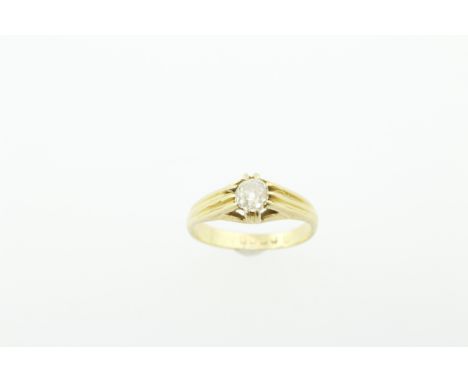 An 18ct H/M diamond solitaire ring, the single old-cut diamond of good clarity tints in colour, approx 0.40cts, size O, appro