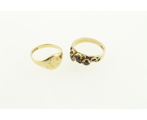 An 18ct H/M signet ring with personalised engraving, size K, together with a garnet set 18ct H/M ring, size M, approx gross w