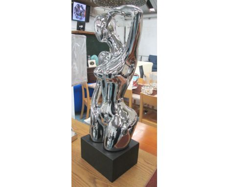 FIGURE OF A FEMALE, in chromed ceramic contemporary style on square base, 73cm H.