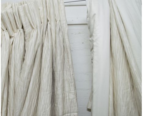 CURTAINS, a pair, in crushed silk, lined and interlined, each 240cm W gathered x 332cm drop. (2)