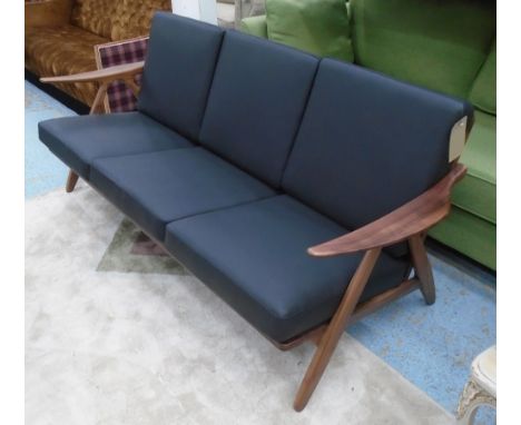 GE270 STYLE SOFA, as designed by Hans J Wegner originally in a walnut frame with black leather cushions (reproductions can re