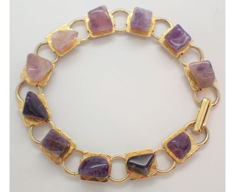 Yellow metal amethyst specimen bracelet 