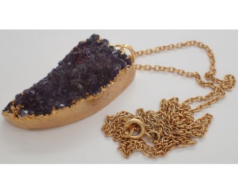 Yellow metal amethyst specimen pendant and chain