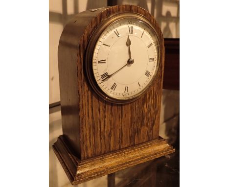Oak cased eight day domed mantel clock
