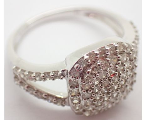 9ct white gold diamond cluster ring set with diamond shoulders size O 3.2g CONDITION REPORT: Red dot on ring will be a reflec