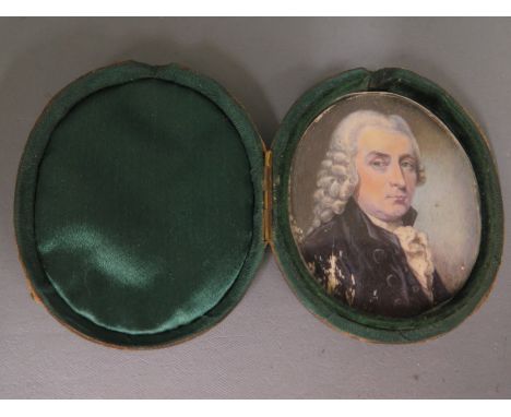 A miniature portrait of a gentleman held within oval frame - 6cm x 5cm - some minor paint loss lower left