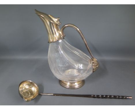 A silver Toddy ladle with George II coin to base of bowl - minor dents to bowl - and a silver plated ewer - Height 24.5cm