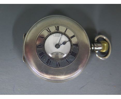 A silver cased half hunter pocket watch by JW Benson London - the white enamel dial with Roman numerals, subsidiary seconds a