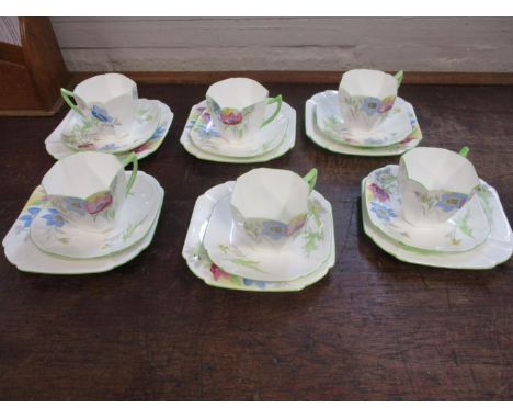 A Shelley six place setting teaset, decorated with flowers, comprising cups, saucers and plates 