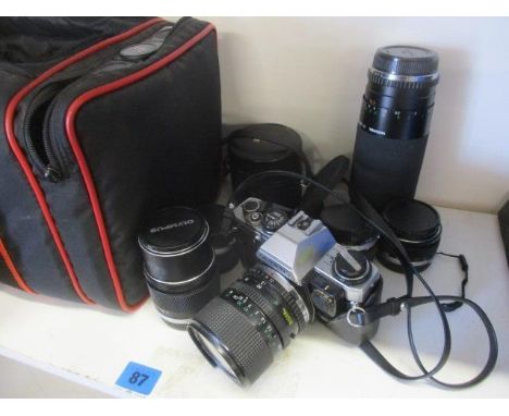 An Olympus CM10 camera and accessories 