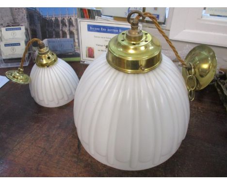 A brass centre light fittings with opaque glass shades, 12" dia and another matching, 6" dia 