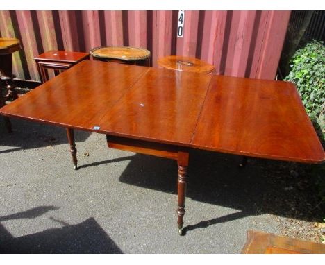 A Georgian mahogany gate leg table, 28 1/2" h x 71" w (extended 