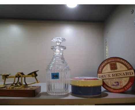 A Georgian glass decanter with stopper, a 2011 Camembert chess pot with lid and vintage postal scales, Mordan & Co 