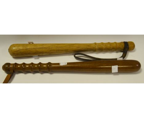 An early 20th century light oak trucheon, leather handle; another  (2)