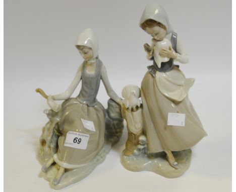 Lladro - a Lladro figure of a girl holding and feeding a Pigeon; another feeding a Dove (2)