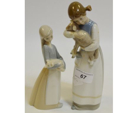 Lladro - a Lladro figure of a girl holding a Piglet; another, holding a kid (2)