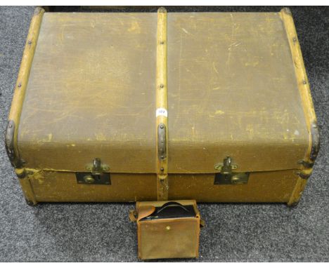 A vintage steam trunk with wooden runners; a Kodak cased camera 