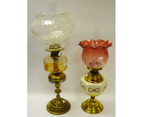 A Victorian oil lamp amber glass reservoir; another cranberry glass shade (2)