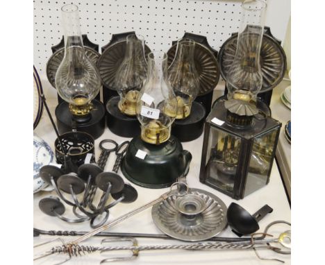 A set of four paraffin lamps; another hand-held; a chamber stick; toasting forks; candle wall sconces; etc. (qty.) 