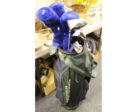 A set of Howson golf clubs, including a full set of irons, a putter, 1 3 and 5 woods; a Dunlop driver; a Donnay bag 