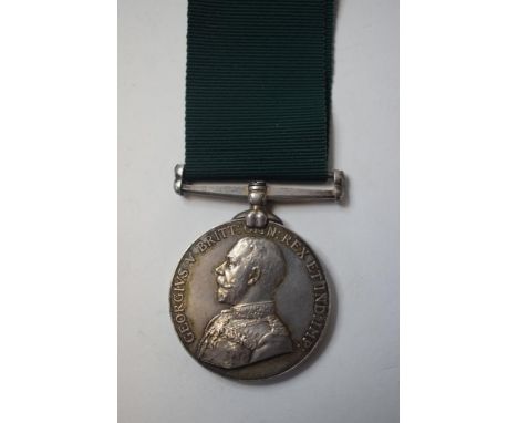 A Volunteer Long Service Good Conduct (GVR) Medal, awarded to Tpr R J C Bryant, Assam VLH AFI