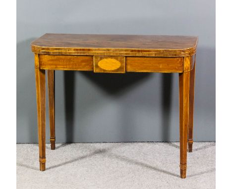 A George III mahogany rectangular tea table with rounded front corners, inlaid with ebony stringing and satinwood bandings, p