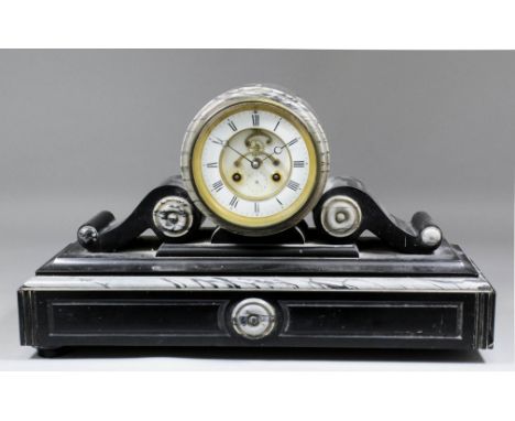 A 19th Century French black marble cased mantel clock by J. Marti & Cie, No. 1999, the 4.75ins diameter white enamelled chapt