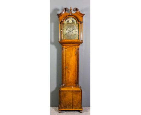 A late 18th Century oak longcase clock by Lawrie of Carlisle, the 13ins arched brass dial with wide chapter ring (formerly si