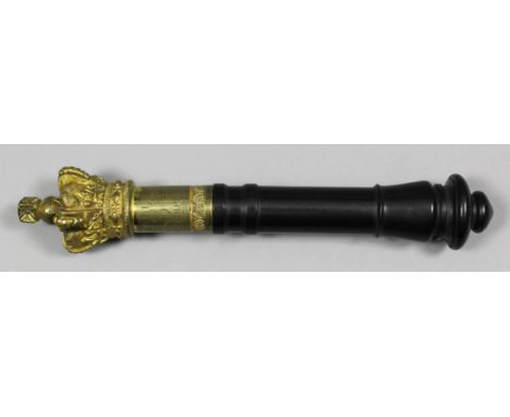 A Victorian brass and ebony handled tipstaff, the gilt crown surmounting a gilt plate engraved "Constable 3 Cardiff", 8ins 