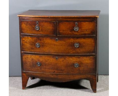 A George III mahogany bow-front chest with moulded edge to top, fitted two short and two long drawers, shaped apron and brack