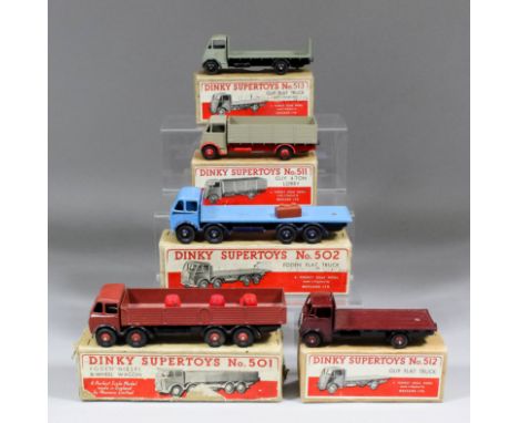 Five Dinky Supertoys commercial diecast model vehicles - Foden diesel eight wheel wagon (No. 501), Foden flat truck (No. 502)
