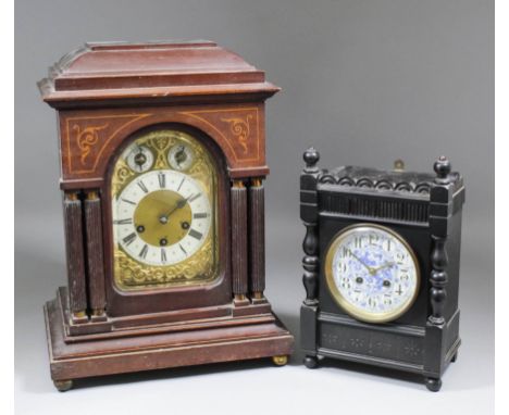 A late 19th Century German mahogany cased mantel clock by Junghans, the rectangular brass dial with 5.25ins diameter silvered