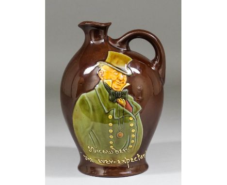 A Royal Doulton Dewars Whisky Kingswear pottery bulbous flask decorated with shoulder-length portrait of "Micawber. The ever 