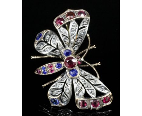 A late Victorian gold and silvery coloured metal mounted ruby, sapphire and diamond set butterfly pattern brooch, set with se