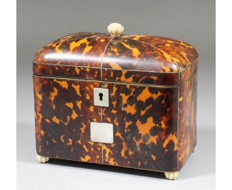 An early 19th Century tortoise-shell rectangular two division tea caddy with domed top, reeded ivory finial and bun feet, 7in