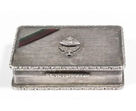 A George VI silver rectangular snuff box with engine turned decoration and cast mounts, the lid applied with a Royal Tank Reg