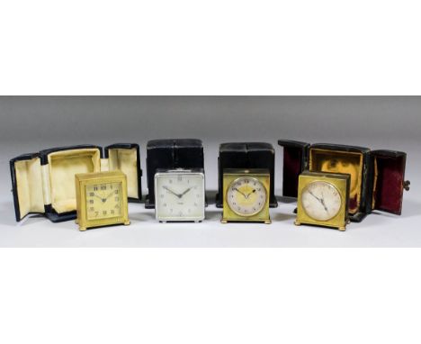 A Zenith gilt metal cased travelling timepiece of Art Deco design, the 1.5ins square dial with Arabic numerals to the timepie