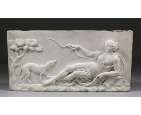 A good late 18th Century Carrara marble panel from a chimney piece, carved with "Diana The Huntress" and a hound, 9ins x 18.1