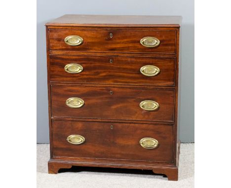 A George III mahogany chest with moulded edge to top, fitted four long graduated drawers, on bracket feet, 30ins wide x 20ins