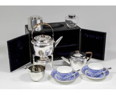 A late Victorian plated picnic set, designed by Christopher Dresser and made by Hukins and Heath No. 2110 and retailed by Leu