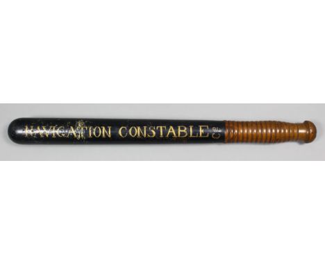 A Victorian turned wood truncheon inscribed in gilt on a blue ground "Navigation Constable", the royal cipher and "S.W.C." (S