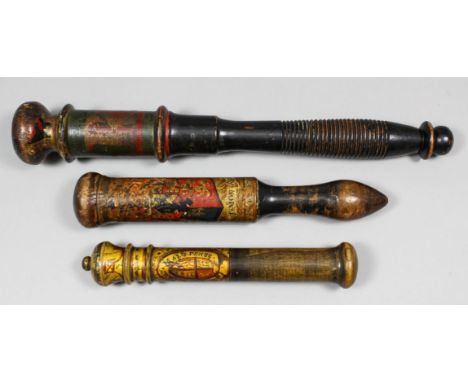 A Victorian turned wood tipstaff painted in red and gold with the "V.1.R." on a green background, 15.25ins, a turned wood tip