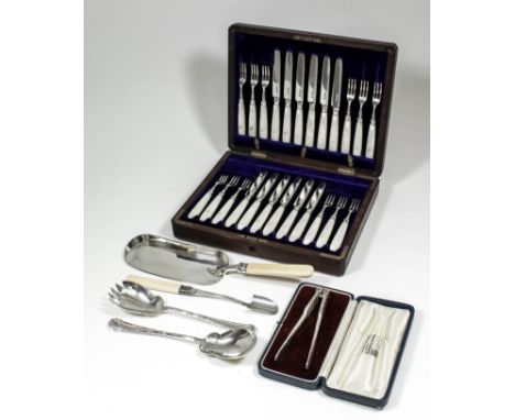 Twelve George V silver and mother-of-pearl handled fruit knives and forks by Harrison Brothers & Howson, Sheffield 1910 (mono