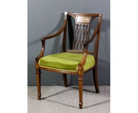 An Edwardian rosewood square back open arm easy chair, the moulded back inset with panel inlaid with floral scroll ornament a