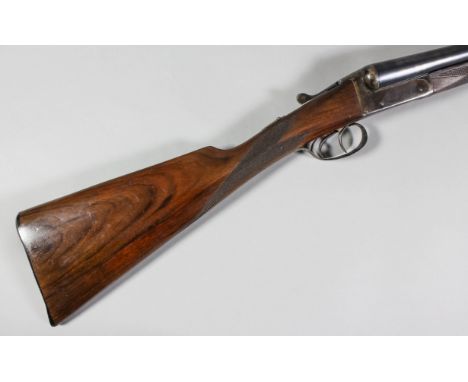 A 12 bore side by side box lock shotgun by Midland Gun Company, Serial No. 110840, with 28ins blued steel barrels, the top ri