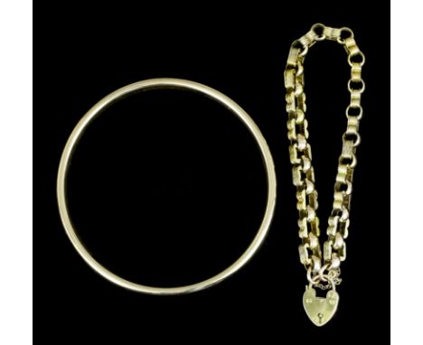 A late Victorian gold coloured metal bracelet with square engraved panelled links alternating with circular panelled loops, 2