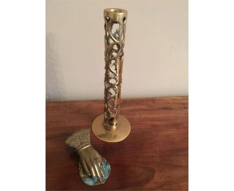 Victorian brass letter holder in the form of a hand with a brass candle stick
